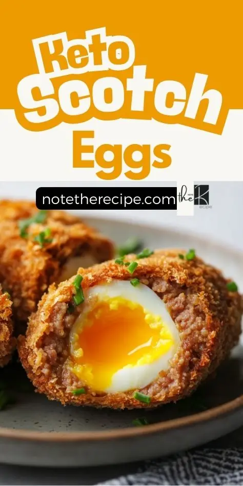 Crispy keto Scotch egg with a golden-brown pork rind crust, cut open to reveal a runny yolk, garnished with fresh chives, and plated on a rustic ceramic dish.
