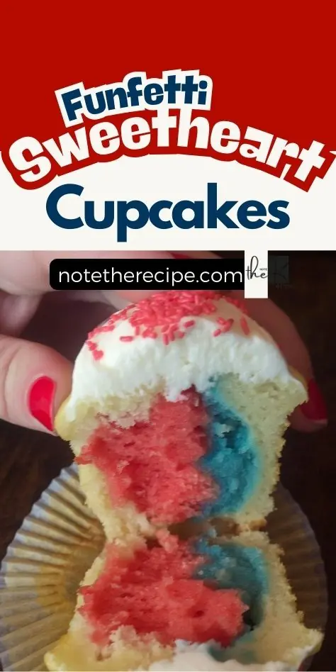 Funfetti Sweetheart Cupcake split open to show red and blue cake layers with white frosting and pink sprinkles