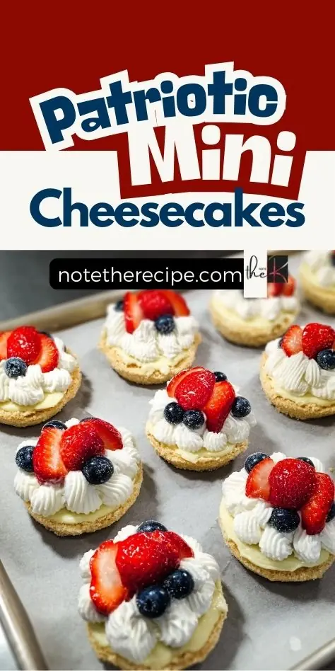 Patriotic mini cheesecakes with whipped cream, strawberries, and blueberries on a baking tray under a red and white recipe banner