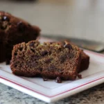 Close-up of sliced chocolate chip zucchini bread on a plate