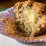 Close-up of moist gluten free zucchini muffin with melted center